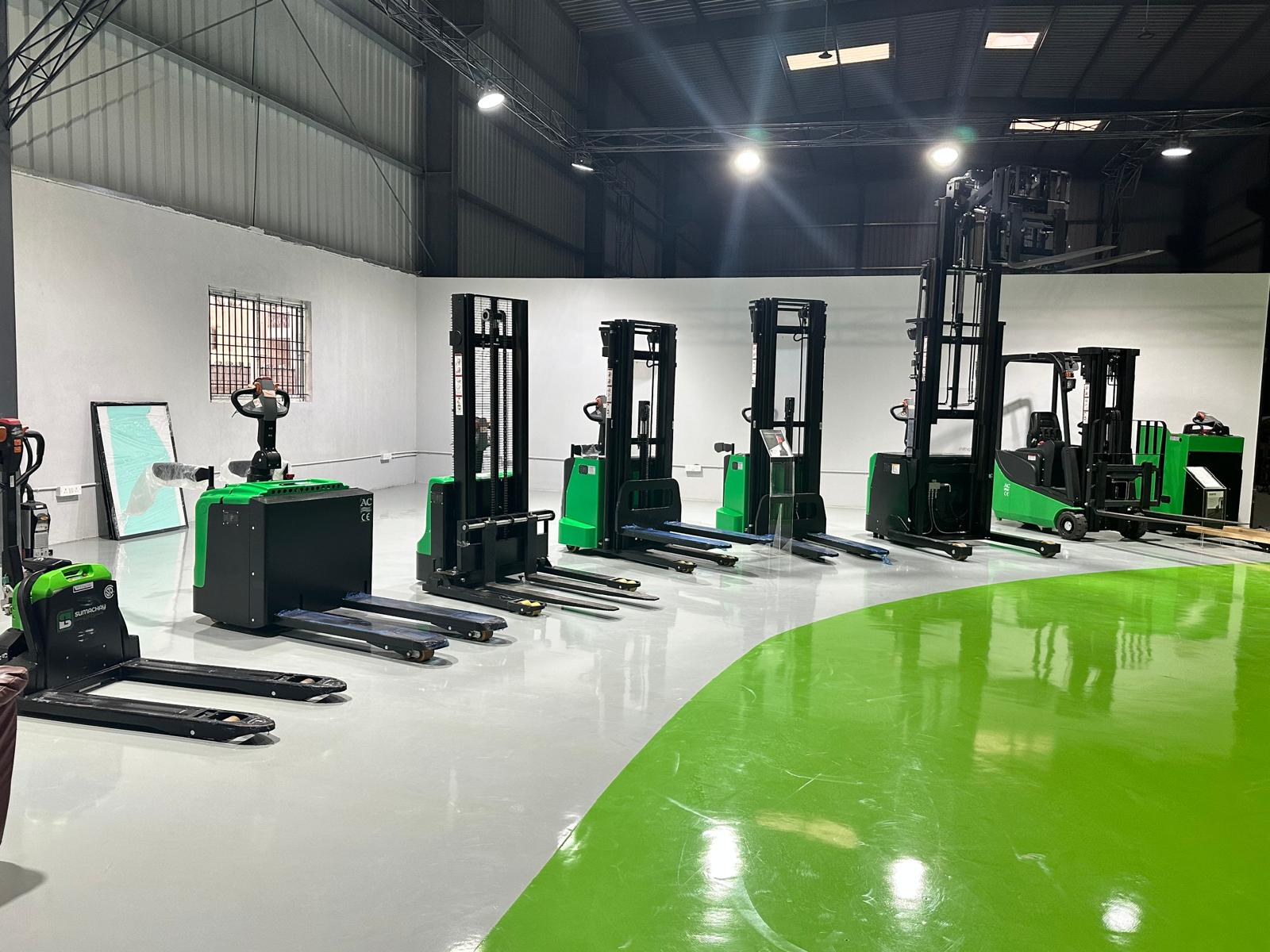 Electric pallet jacks, lift tables, and industrial material handling equipment operating in warehouse facilities